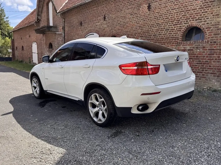 BMW X6, vue arrière, vitres teintées par DarkTeinte